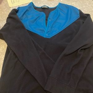 Cotopaxi pull over fleece shirt.